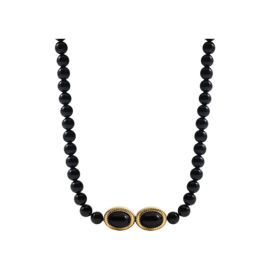 Black agate beaded necklace on white background