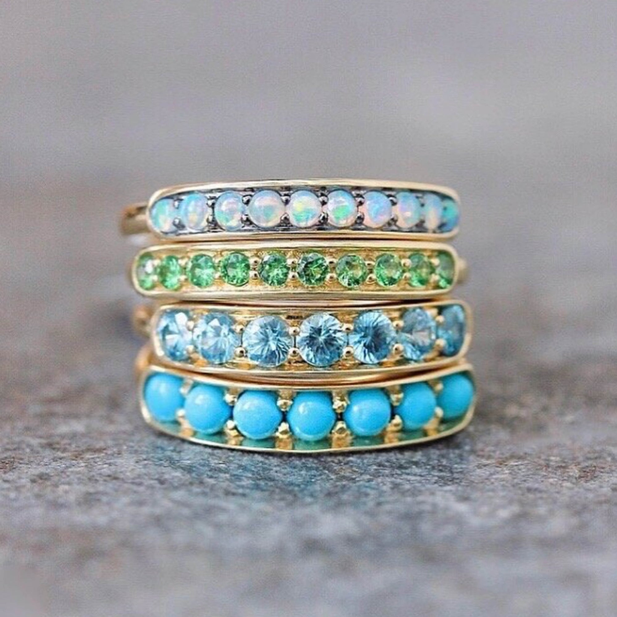 Jane Taylor Half Eternity Band in Tsavorite Garnet