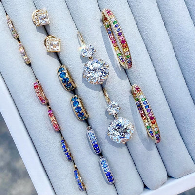 Jane Taylor Slim Huggie Hoop Earring in Blue Sapphire