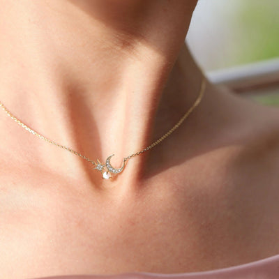 Crescent Moon and Starburst Necklace with Opal Accent