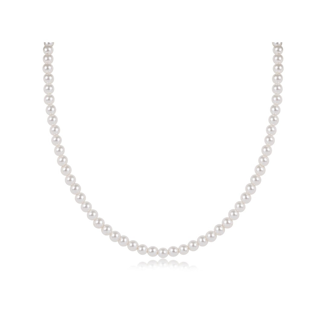 A classic single-strand pearl necklace with uniform white pearls, displayed in a U-shape against a clean white background.