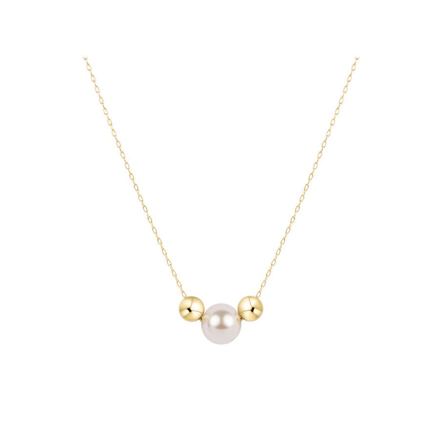 A delicate gold chain necklace featuring a central white pearl flanked by two small gold beads, presented on a clean white background.