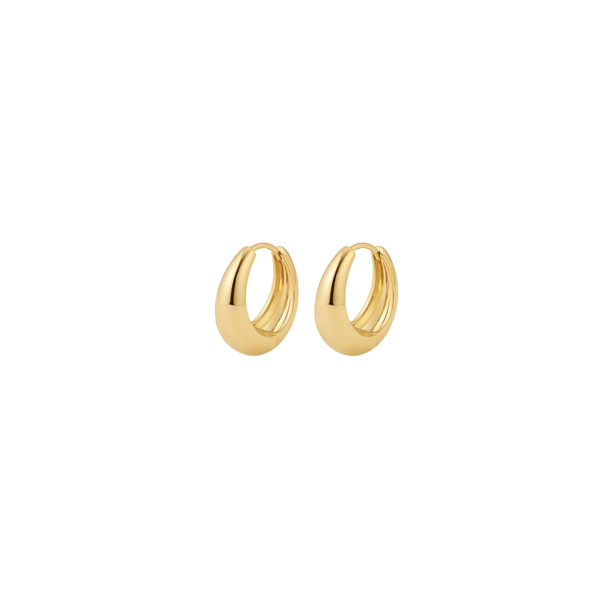 A pair of polished gold huggie hoop earrings on a solid white background.