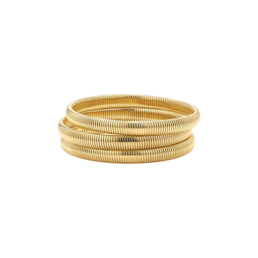 A stack of three gold-plated snake chain bangles on a solid white background.