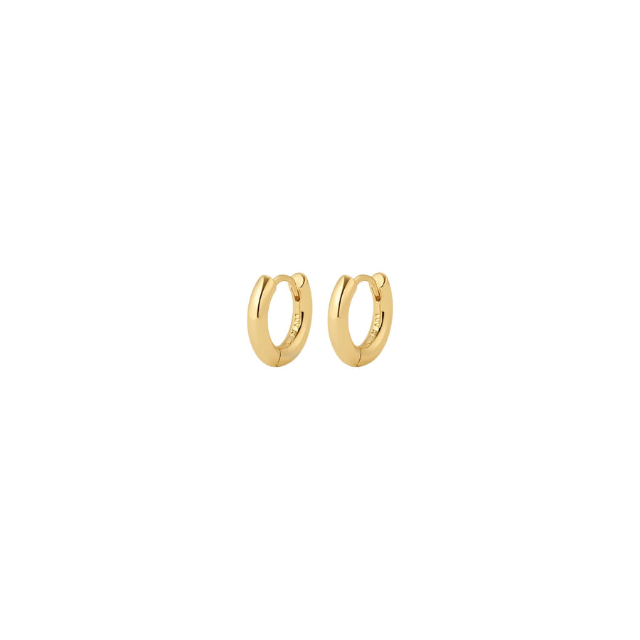 Gold small hoops on white background.