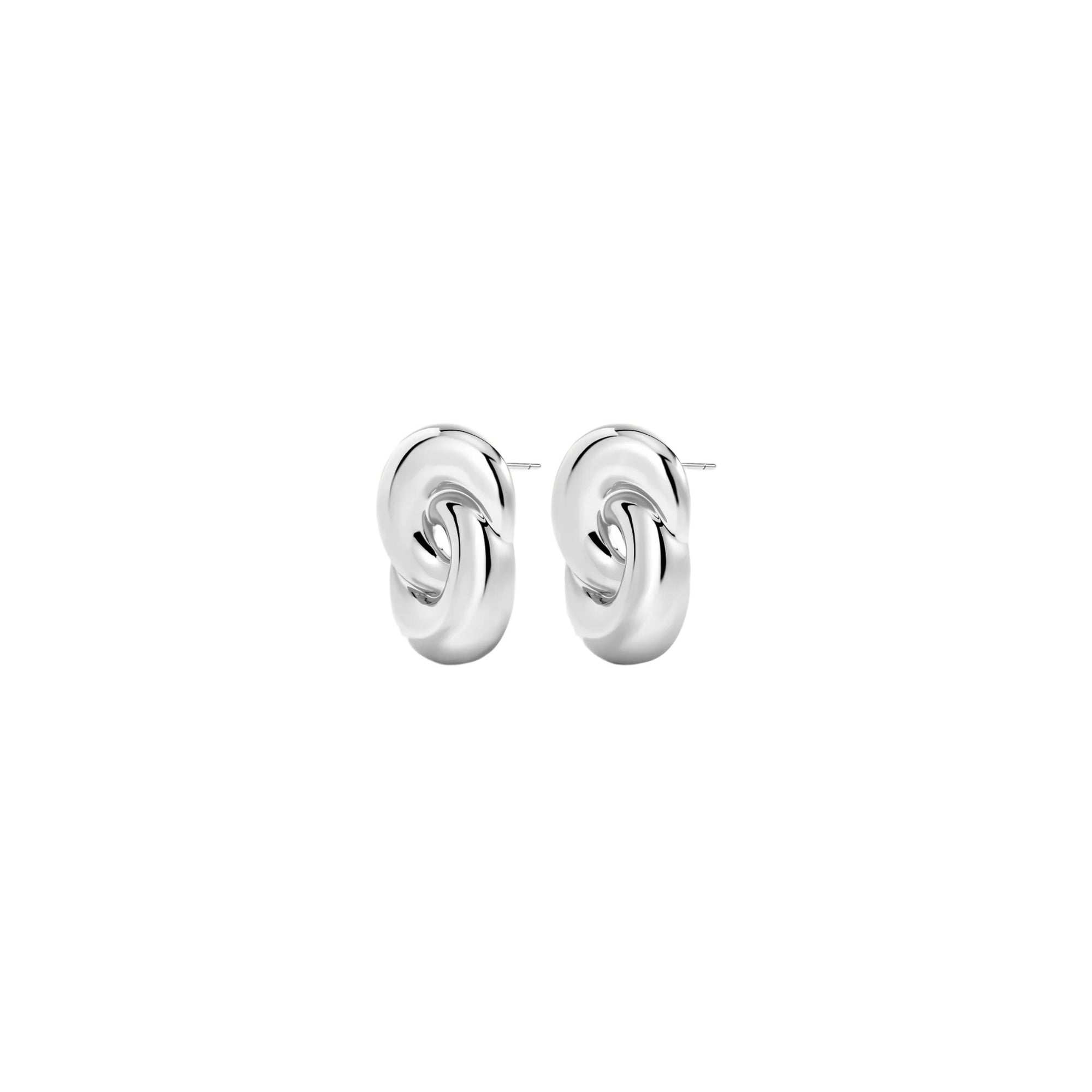 Silver wavy earrings on a white background
