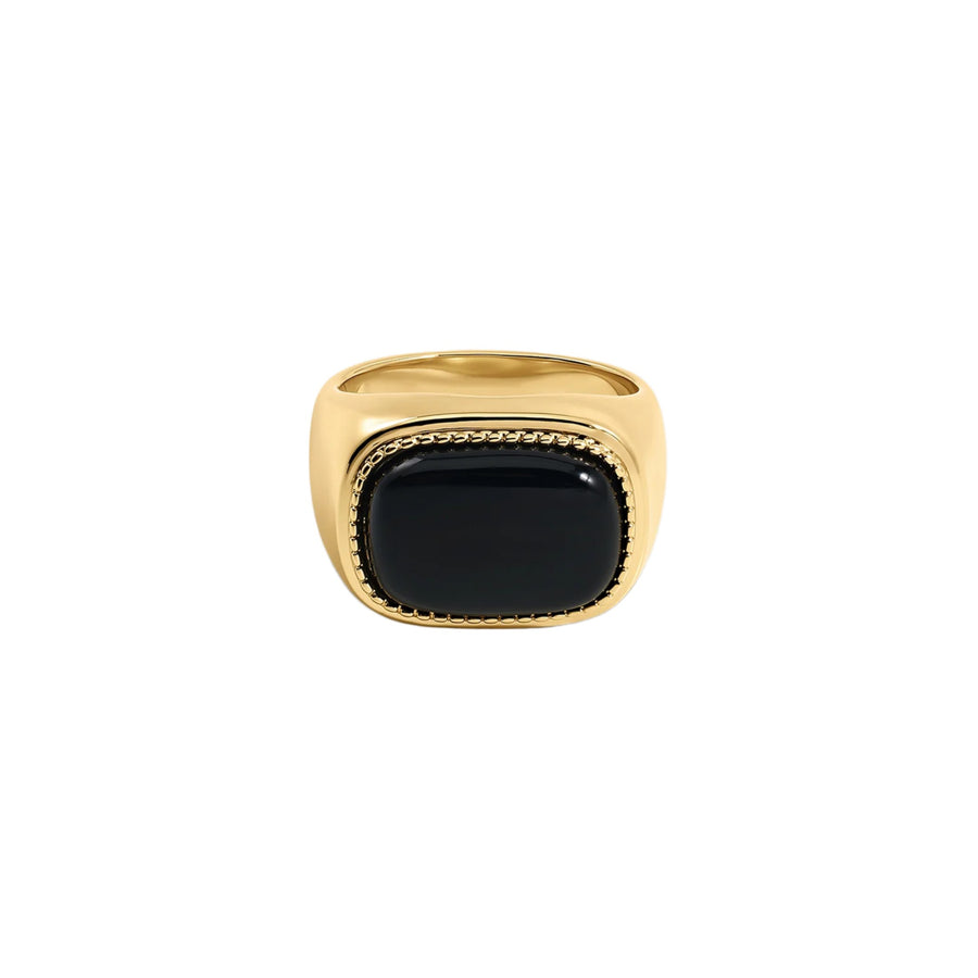 A gold signet ring with a large, polished black cabochon stone, shown against a plain white background.