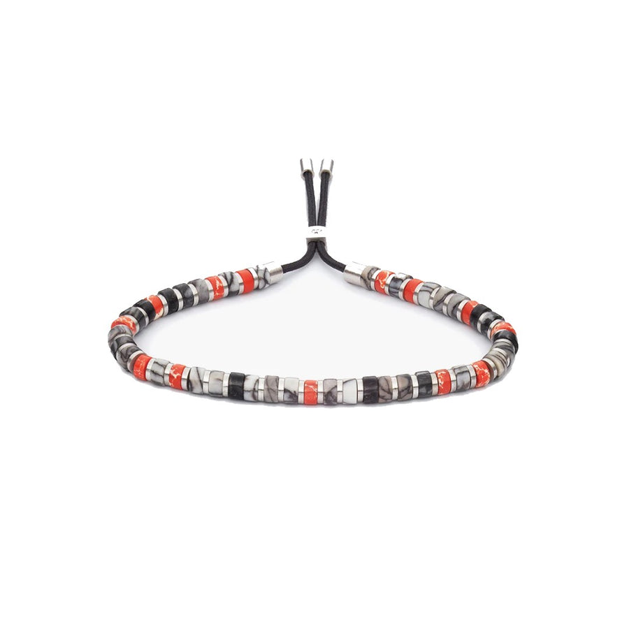 A beaded bracelet with alternating black, gray, white, and red-orange beads, featuring a black cord and silver-toned metal tips, displayed on a clean white background.