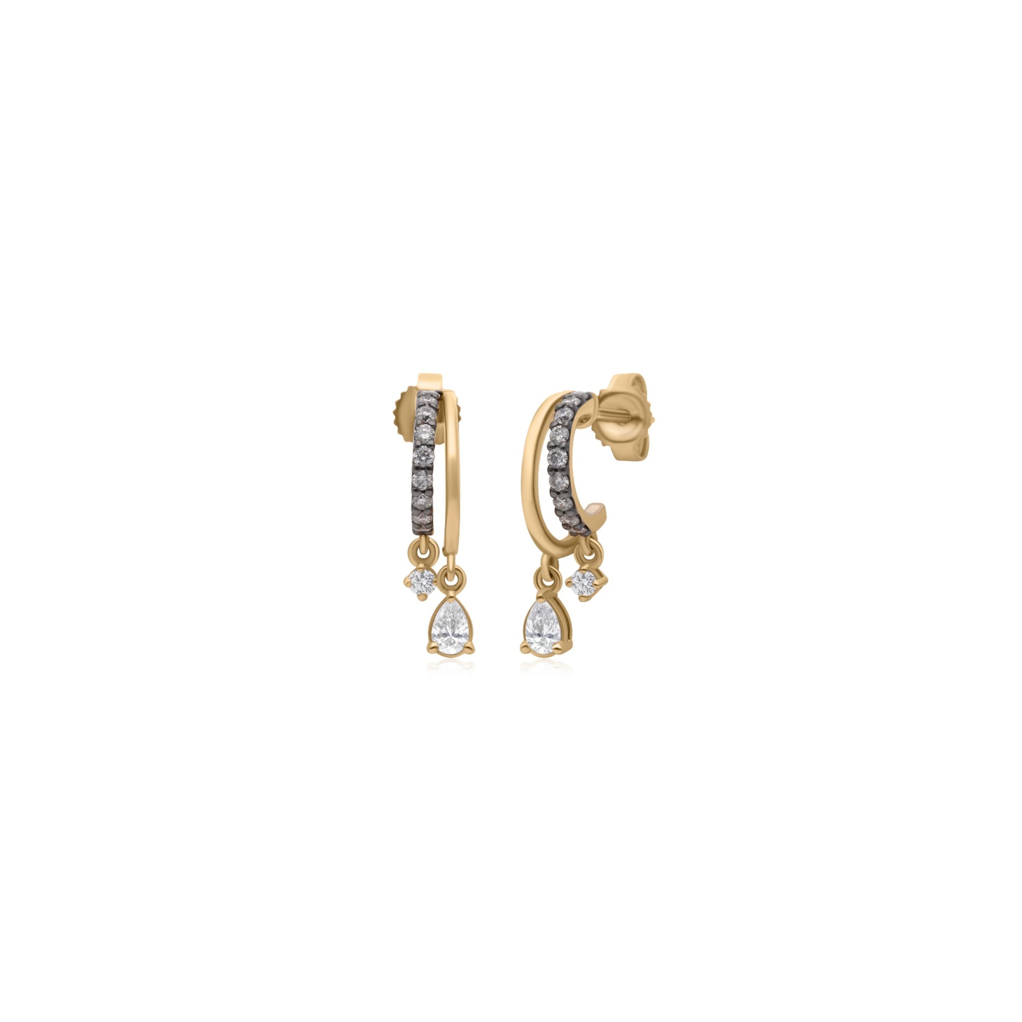 A pair of gold huggie hoop earrings with pavé-set clear stones and pear-cut crystal drop charms, shown on a plain white background.