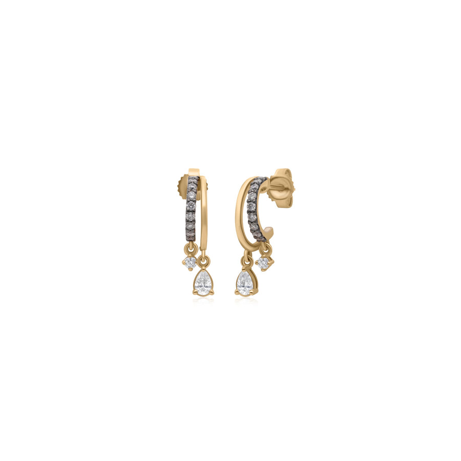 A pair of gold huggie hoop earrings with pavé-set clear stones and pear-cut crystal drop charms, shown on a plain white background.