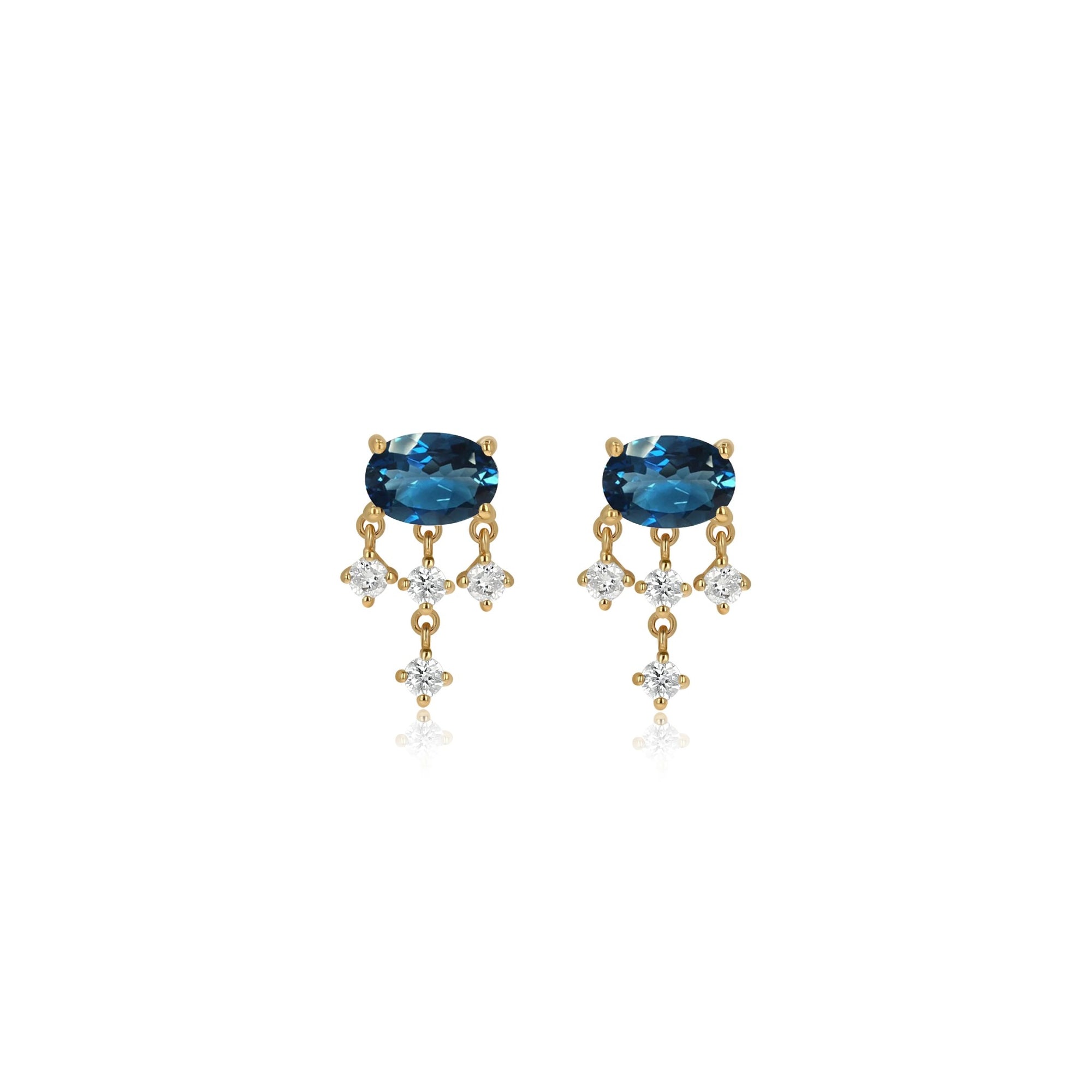 Pair of gold earrings on a white background