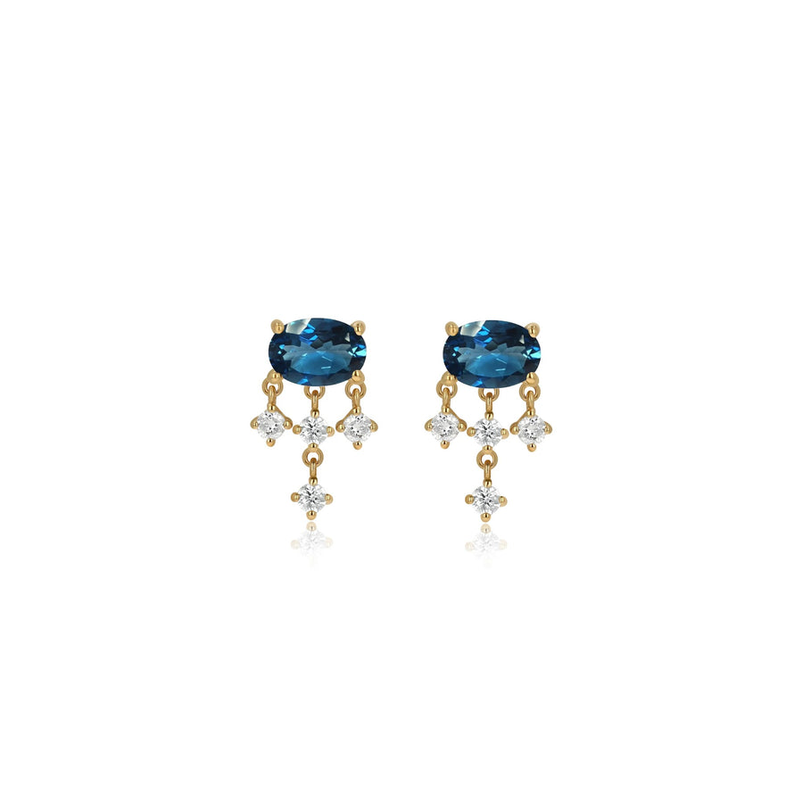 Pair of gold earrings on a white background