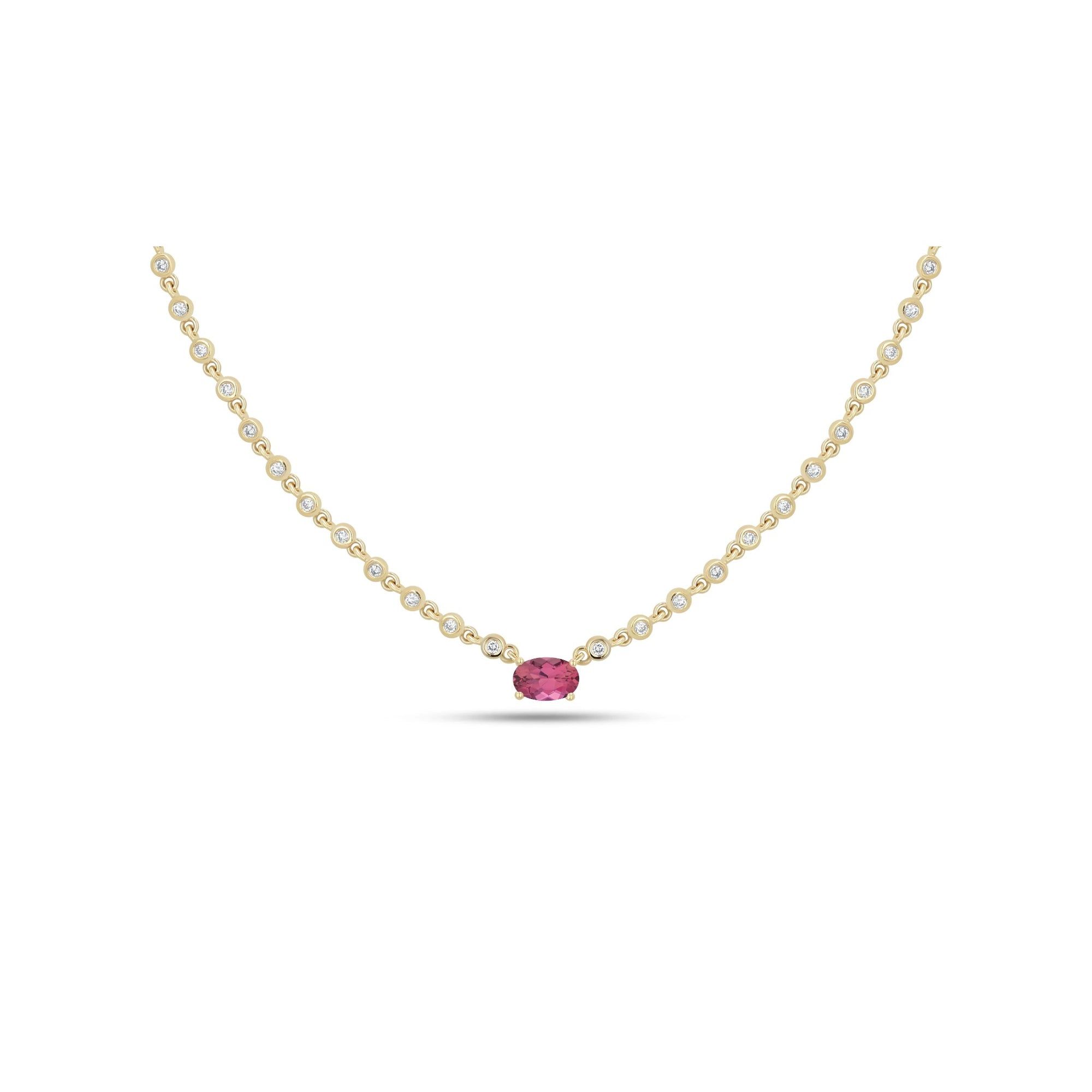 A delicate yellow gold chain necklace featuring a single oval-cut pink gemstone pendant, accented with small round clear stones along the chain, set against a plain white background.
